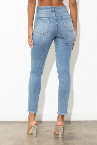 MID RISE DISTRESSED SKINNY JEANS