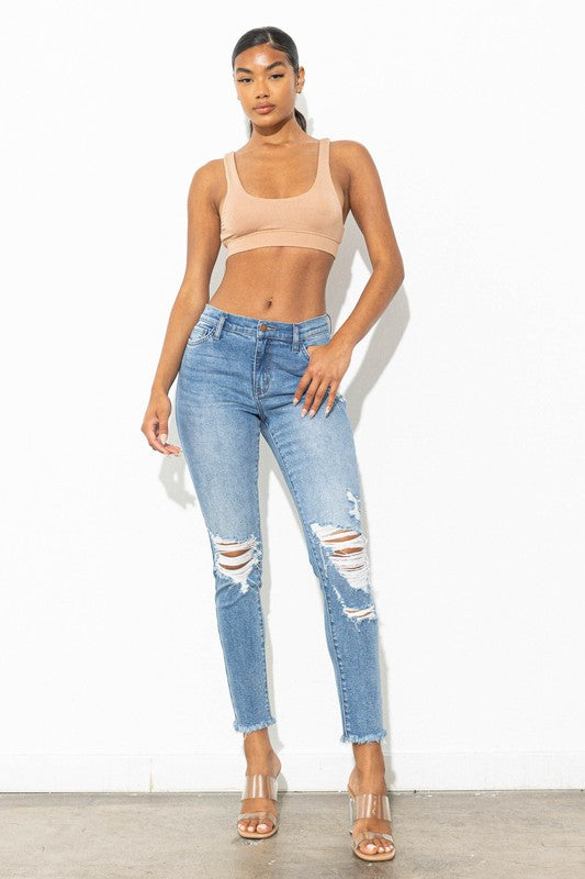 MID RISE DISTRESSED SKINNY JEANS
